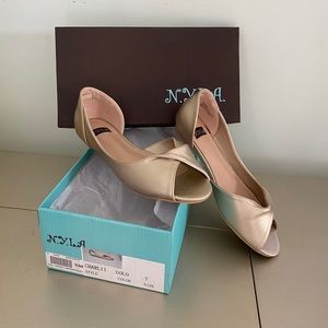 N.Y.L.A. gold twist flats